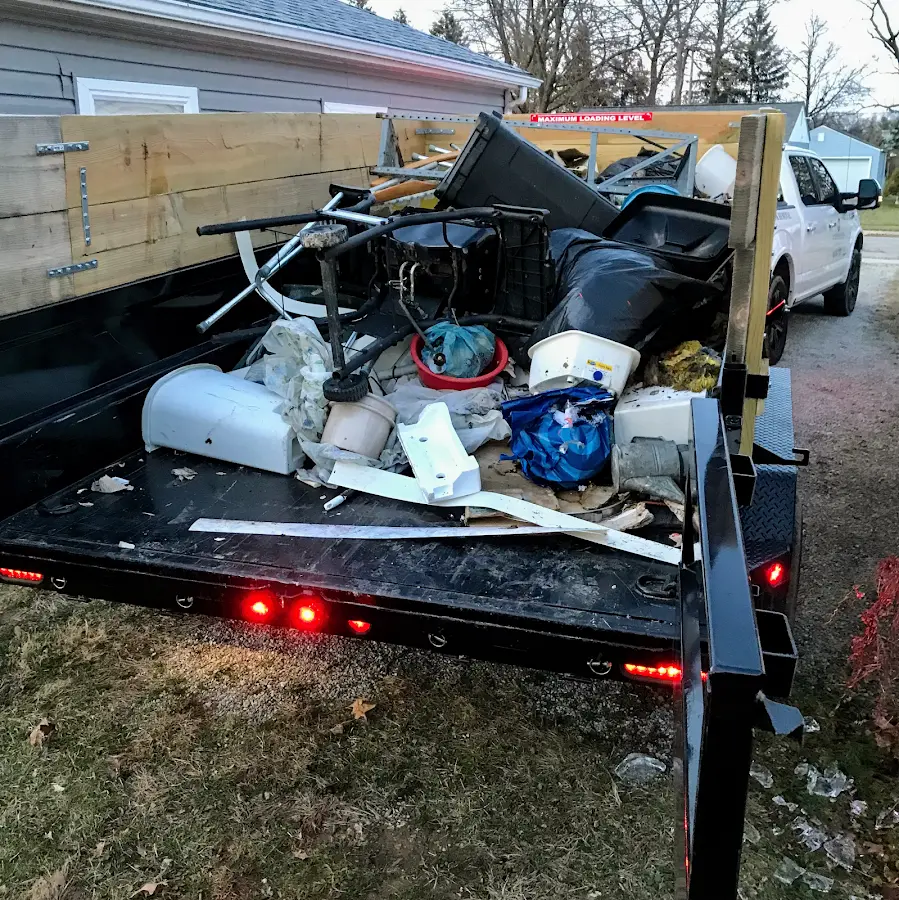 Roll-off dumpster delivered to a residential driveway in Detroit Lakes